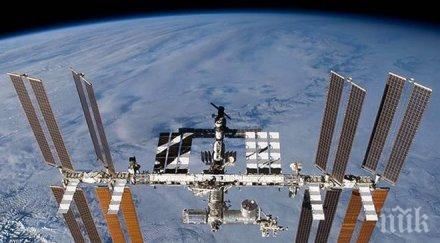вдигат километър международната космическа станция