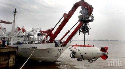 китайски батискаф започна спускане марианската падина