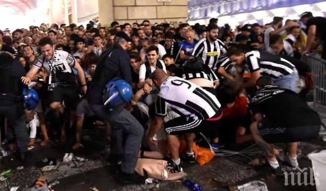Паника! Луд фен на Ювентус хвърли петарда на площад Сан Карло в Торино, има  поне 200 ранени