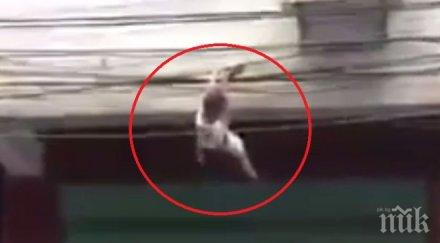 родено късмет момченце падна висок етаж оцеля видео