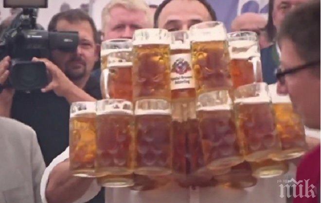 МАШИНА! Германец счупи собствения си рекорд за носене на най-много халби с бира (ВИДЕО)