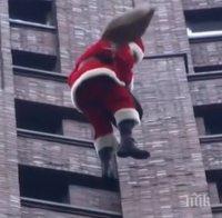 Дядо Коледа изненада деца, спускайки се от покрива на небостъргач в Берлин