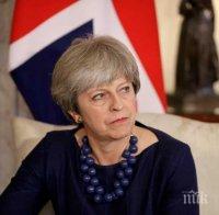 Тереза Мей оспори твърденията на финансовия си министър за Брекзит