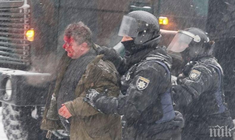 Най-малко 10 ранени и 100 арестувани при полицейска акция среще протестен лагер в Киев