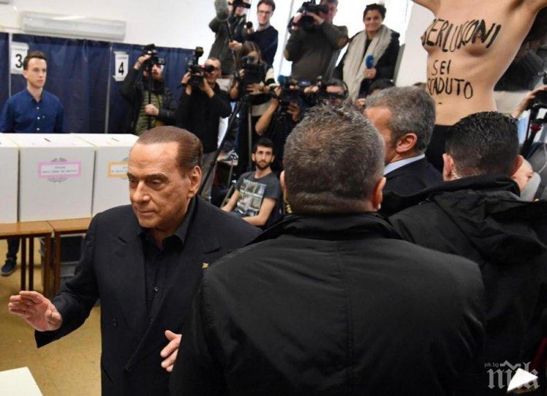 Активистка плаши Берлускони с голи гърди