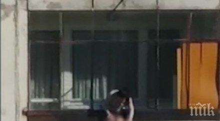 прокуратурата погна майката увесила бебето терасата