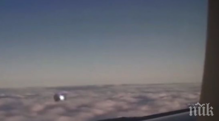 шокиращ кадър заснеха нло борда самолет