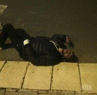 ВНИМАВАЙТЕ! Циганин лежи в центъра на Пловдив! Симулира побой