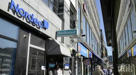 шведска банка сменя половината служители роботи