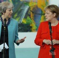 УНИЗЕНА! Меркел не се ръкува с Тереза Мей, подмина я като малка гара (ВИДЕО)