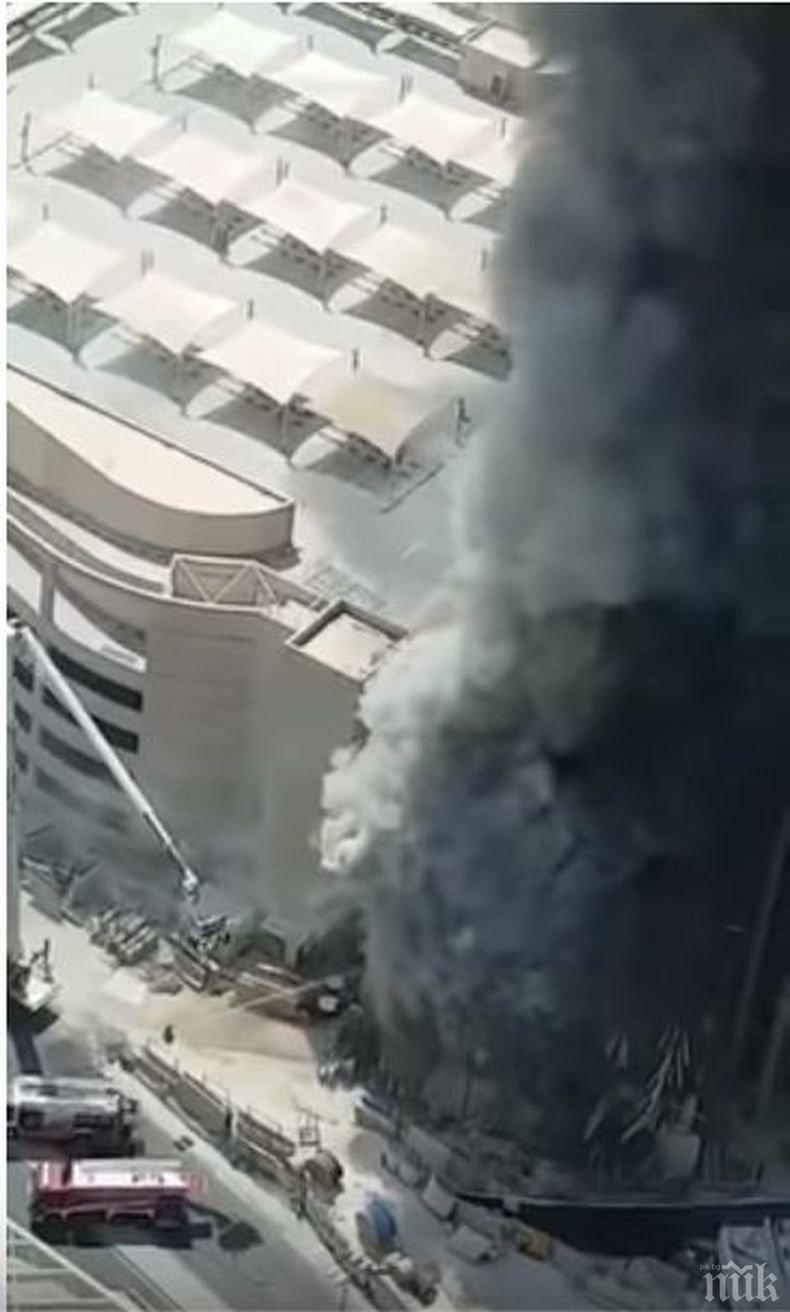 ОГНЕН УЖАС! Новостроящ се небостъргач в Кувейт избухна в пламъци (ВИДЕО)