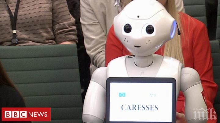Говорещ робот в парламента направи за смях Тереза Мей