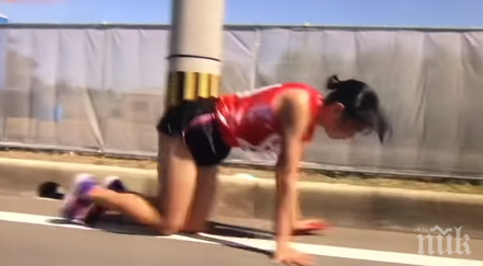 спортен хъс лекоатлетка допълзя финала счупен крак видео