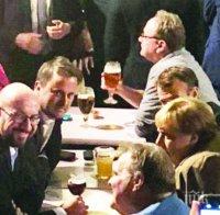 Меркел и Макрон си бъбрят на бира и картофки 