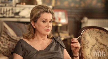 висша мода катрин деньов разпродава търг тоалетите сен лоран