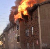 Родители хвърлиха бебето си от прозореца, за да го спасят от пожар
