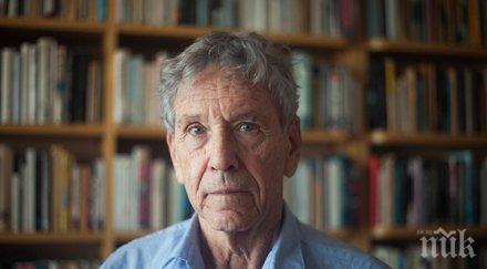 почина известният писател амос