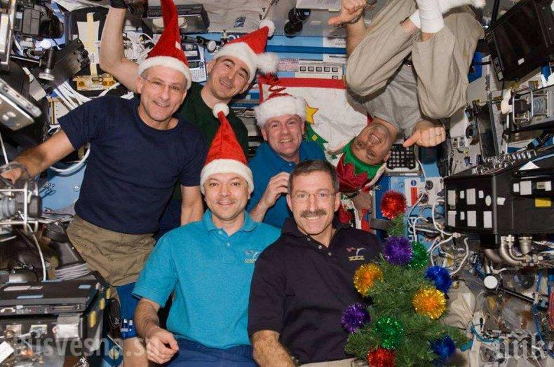 Руските космонавти на МКС ще посрещнат Нова година с шампанско... на снимка