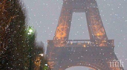 снежна буря затвори айфеловата кула видео