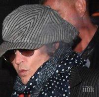 Джони Деп кацна в Белград - 10 гардове го следват по петите 