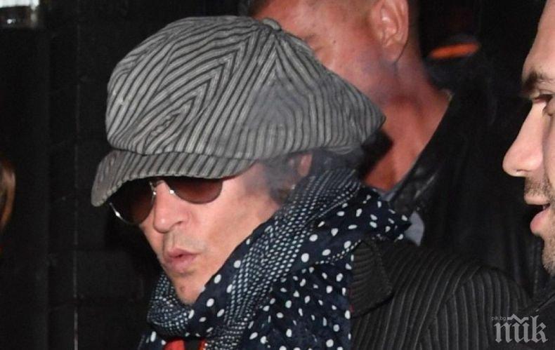 Джони Деп кацна в Белград - 10 гардове го следват по петите 