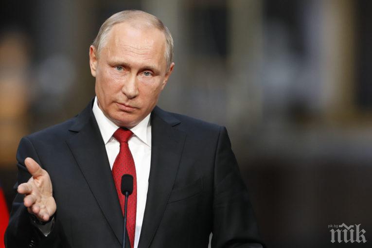 Путин със закон за кръстника в Русия