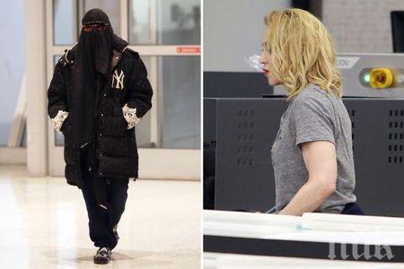 Мадона се появи с бурка на летището в Ню Йорк