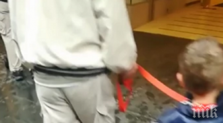 тотален шок дядо разхожда внучето въже около врата снимка