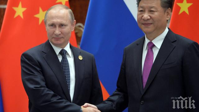 Какво точно си казаха Путин и китайският му колега
