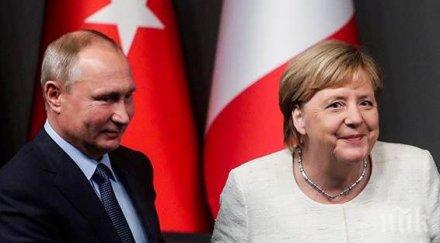 путин меркел срещнаха крак осака