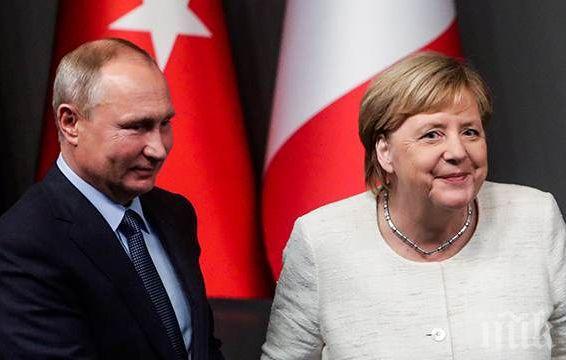 Путин и Меркел се срещнаха на крак в Осака 