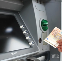 Задържаха българи в Португалия за източване на банкови карти