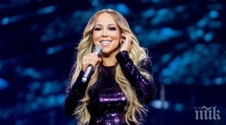 коледният хит марая кери влиза книгата гинес