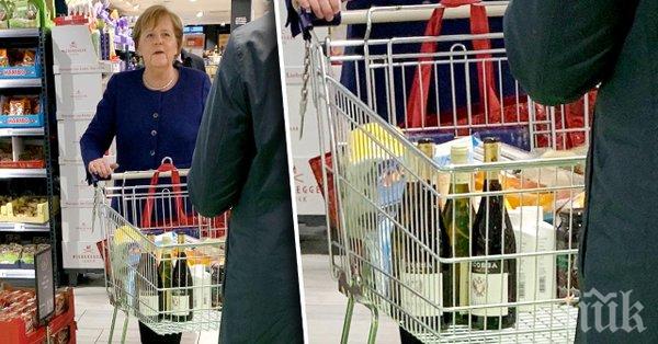 БЕЗ МАСКА: Меркел се запасява с тоалетна хартия и вино (СНИМКА)