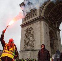 Продължават сблъсъците между протестиращи и полицията в Париж
