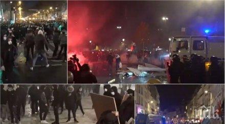 извънредно париж гори полицията овладее ситуацията демонстранти взривяват ракети удариха централна банка видео снимки
