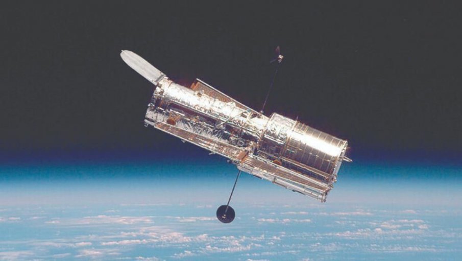 УНИКАЛНО: Телескопът Хъбъл засне сблъсък между галактики (СНИМКА)