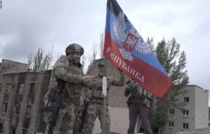 пушилин издигна флага днр бахмут снимка