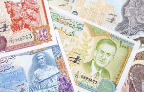 сирия представя банкноти национални символи лидери