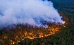 ОГНЕН АД В СИБИР! Мащабни пожари изпепелиха гори и сгради, най-малко осем души са загинали