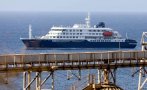 круизът смъртта двама умрелите кораба пътували месеци света